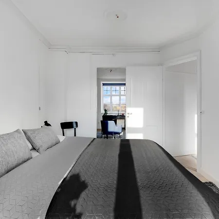 Апартаменты Hyggelig Two-bedroom In Osterbro *