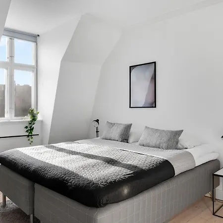 Апартаменты Hyggelig Two-bedroom In Osterbro *
