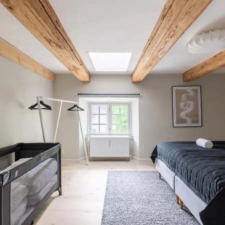 With Exposed Ceiling Beams