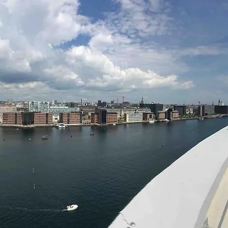 At The Waterfront Апартаменты *